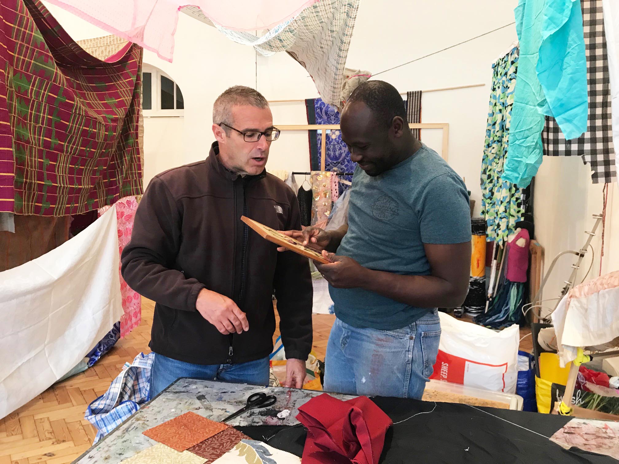 Andrew Omoding with artist Professor Trevor H.J. Marchand