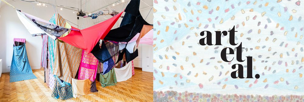An installation of suspended fabric and objects