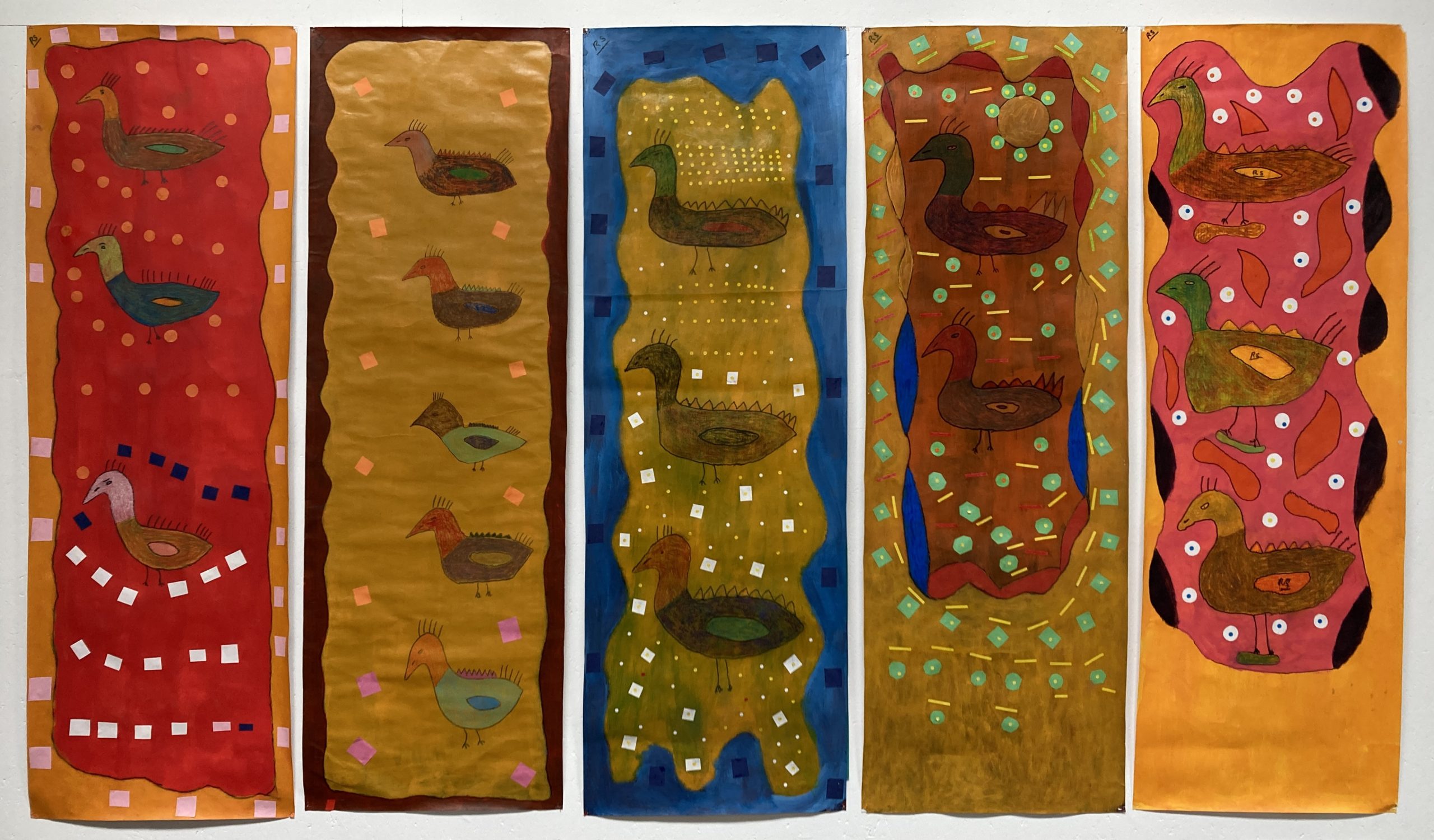 Five panel paintings aligned in a row across a wall. Vibrant painted borders, ducks and shapes merge across the works.