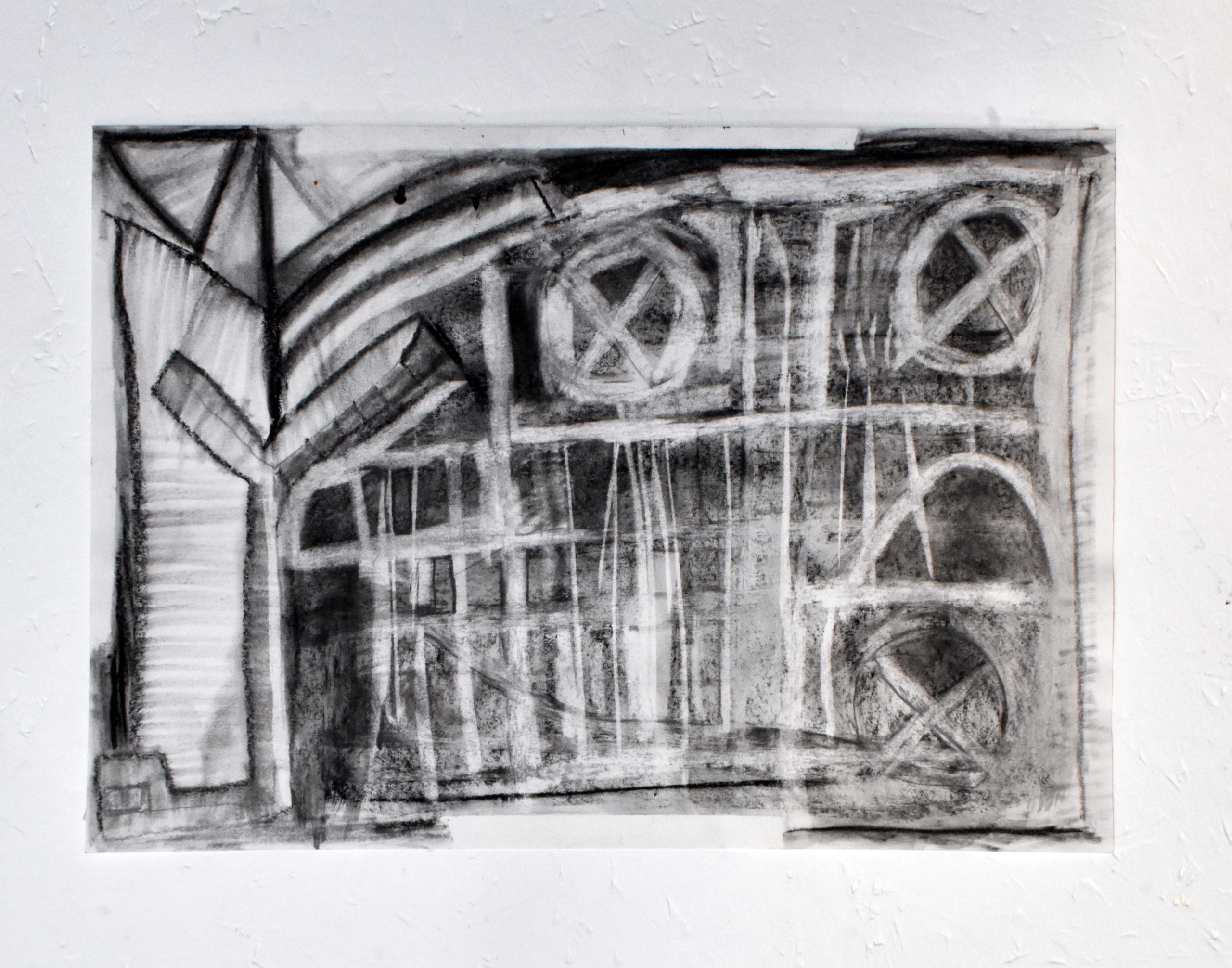 An image of a small, rectangle, abstract drawing in black charcoal. Vague patterns and shapes emerge from various shadows and highlights.