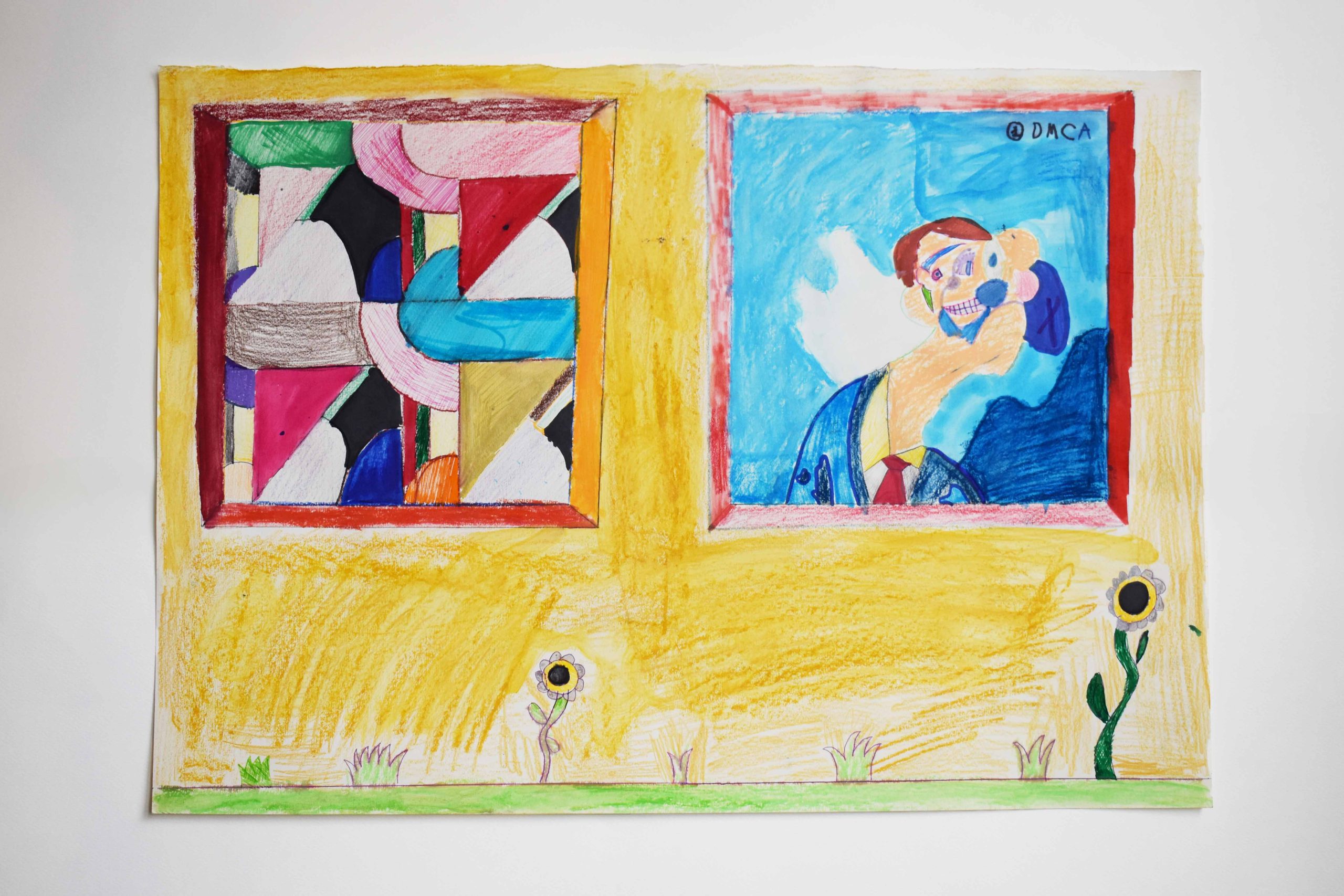 A small landscape drawing in coloured pencil with two squares picturing an abstract, cubist art, and a surreal character. Outside of the squares is yellow wall, green grass, and flowers growing.