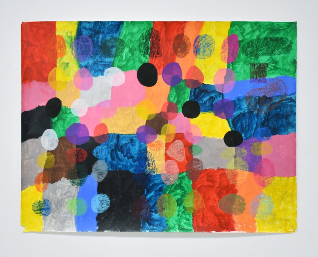 A colourful small, landscape painting in acrylic, oil pastel and paint pen on paper. Thumb sized circles scatter across a patchwork of rough rectangles.